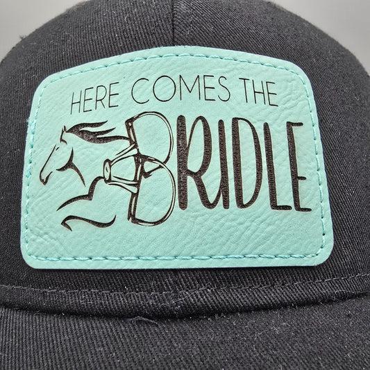 Here Comes The Bridle Port Authority Low-Profile Black Patch Logo Trucker Hat