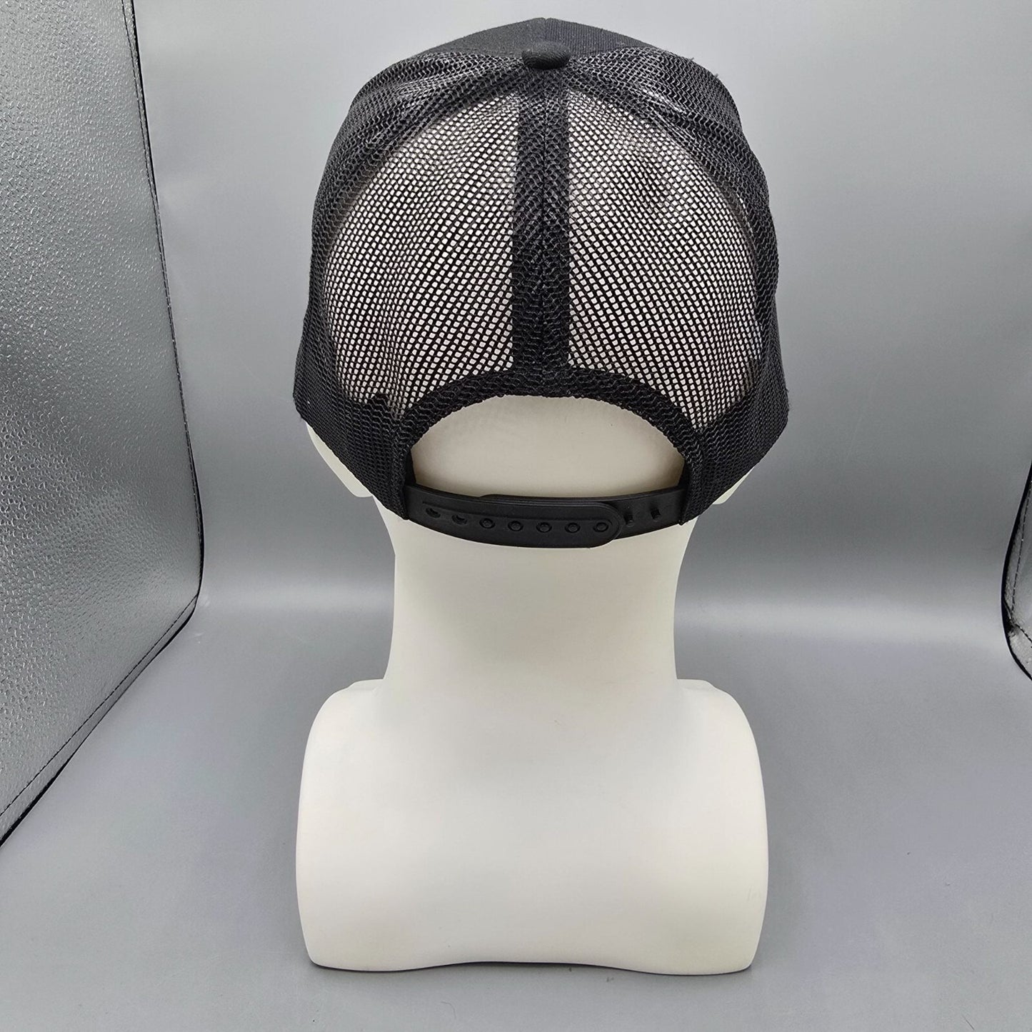 Here Comes The Bridle Port Authority Low-Profile Black Patch Logo Trucker Hat