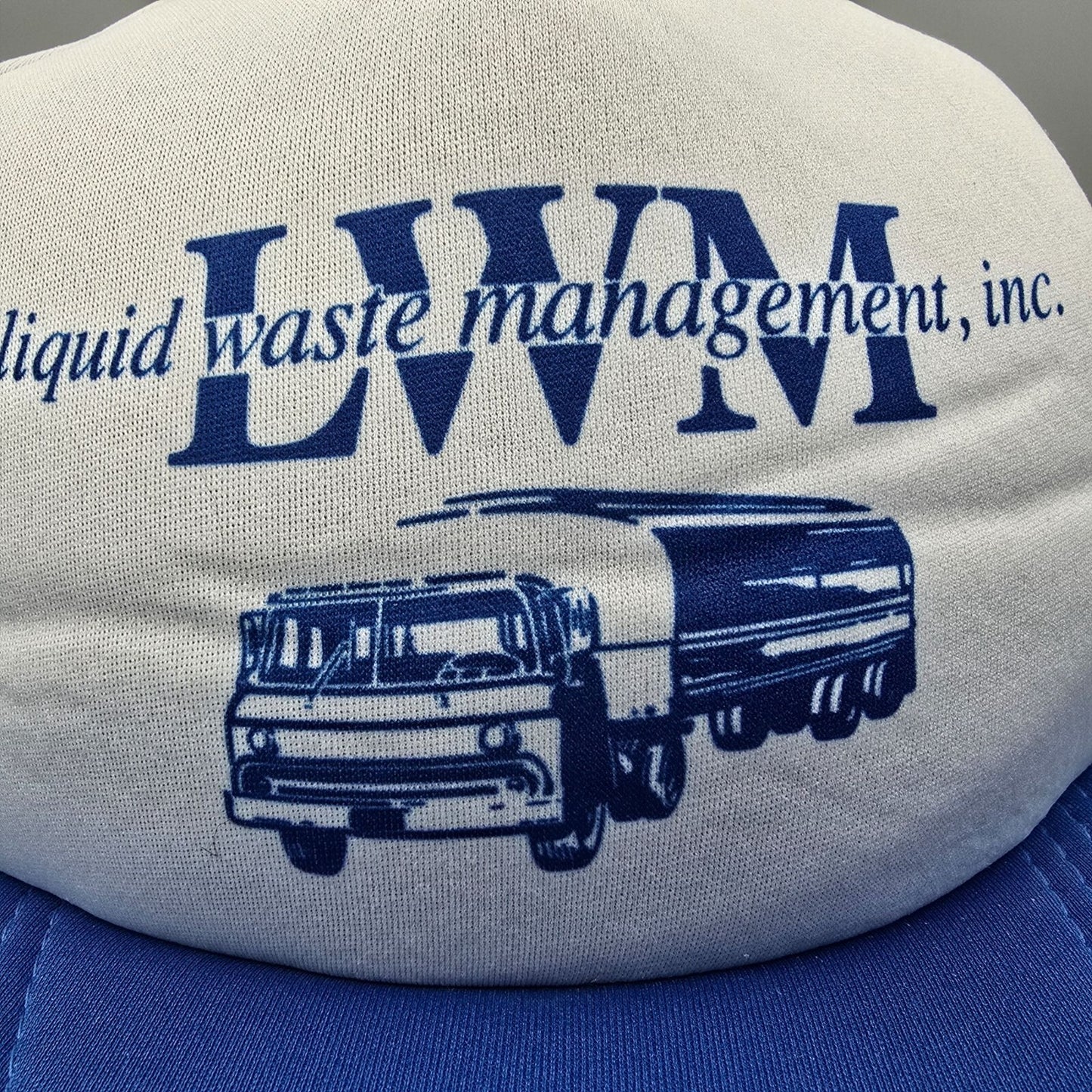 Distressed LWM Liquid Waste Management, Inc. Fort Lupton Colorado Trucker Hat