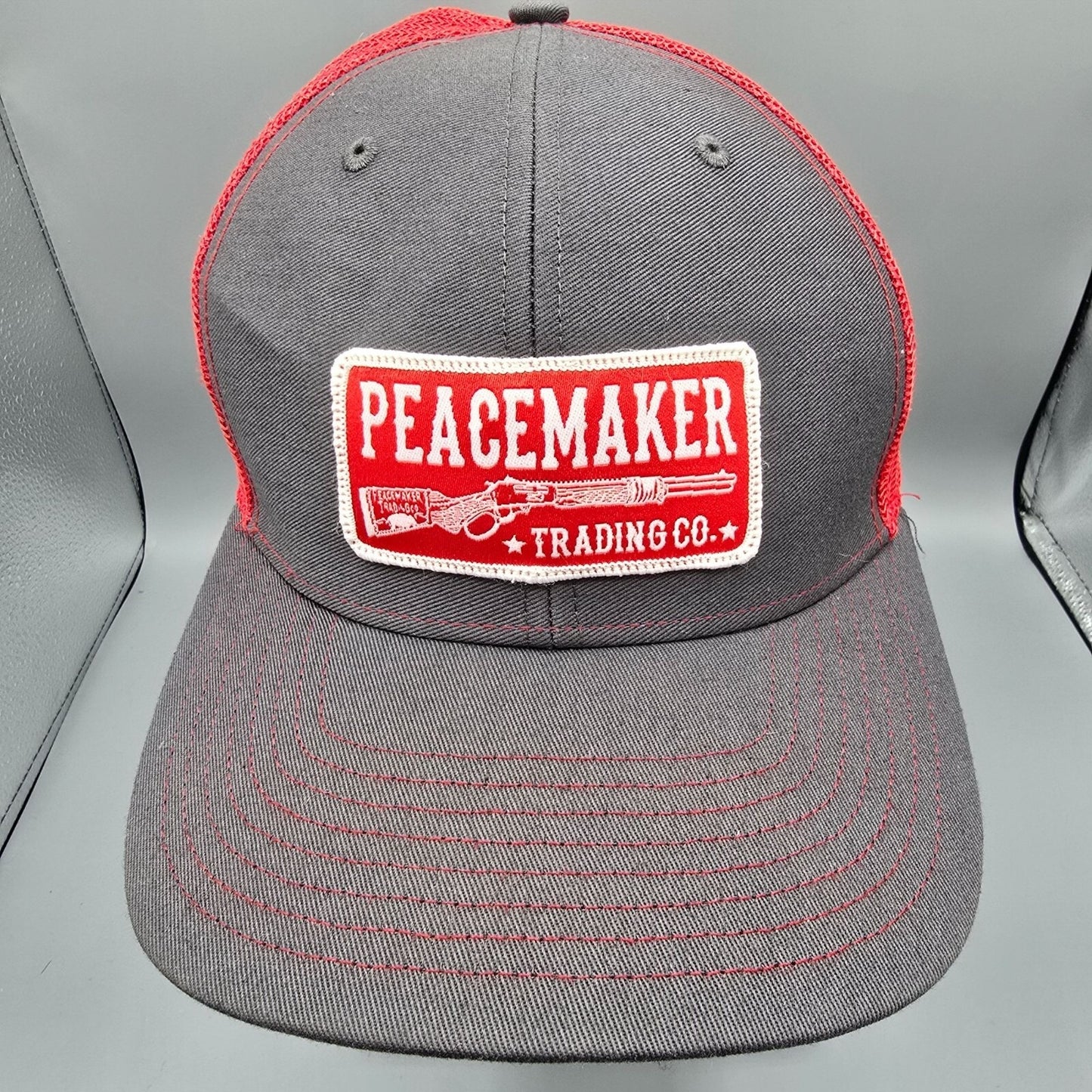 Peacemaker Trading Co. Patch Logo Gray & Red Snapback Richardson Trucker Hat