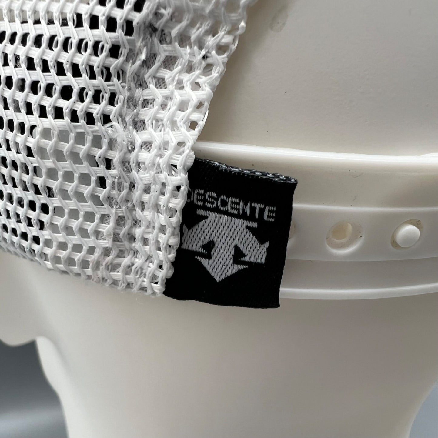 Descente Skiing Mesh Back Six Panel Blue and White Embroidered Logo Trucker Hat