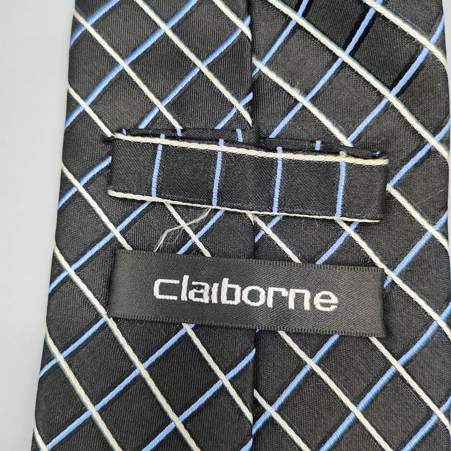 Claiborne Mens Black, Blue, and White Grid Pattern Textured 100% Silk Necktie