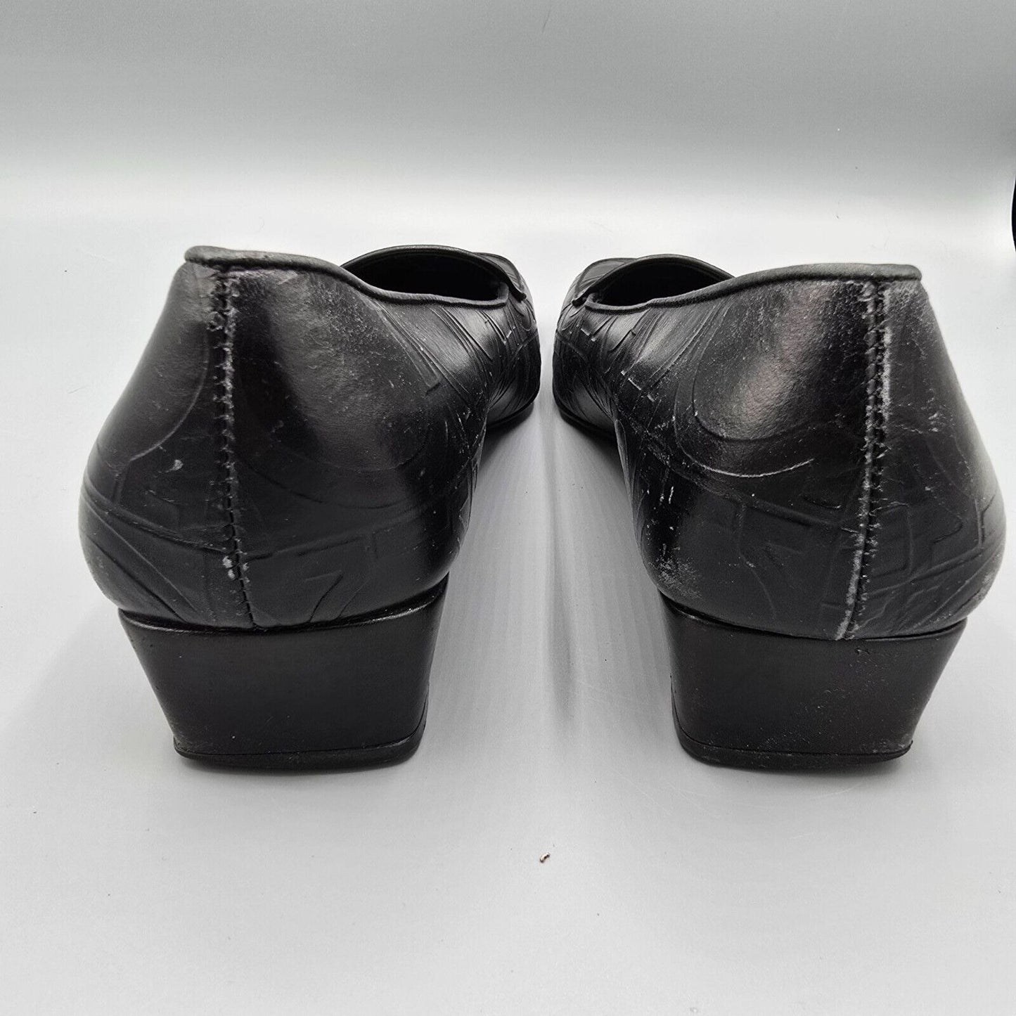 Vintage Salvatore Ferragamo Embossed Gancini Pattern Black Leather Loafers (6B)