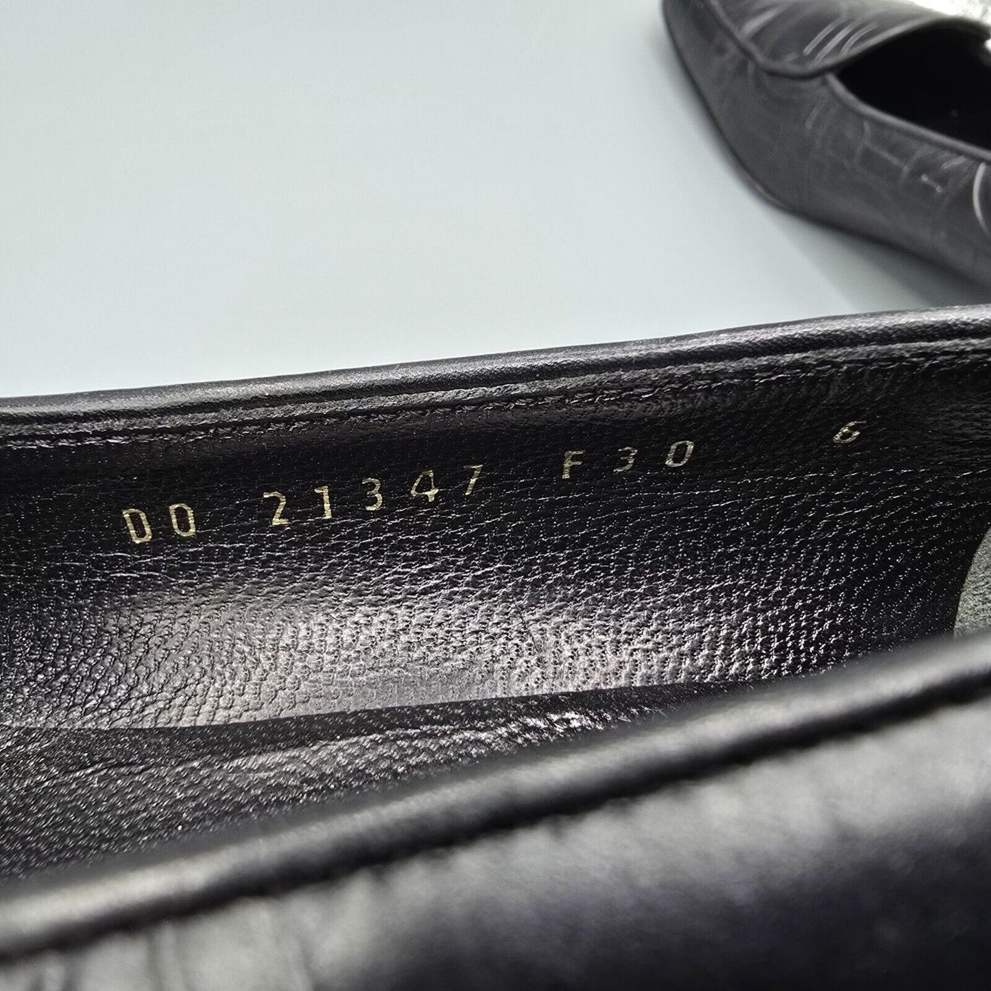 Vintage Salvatore Ferragamo Embossed Gancini Pattern Black Leather Loafers (6B)