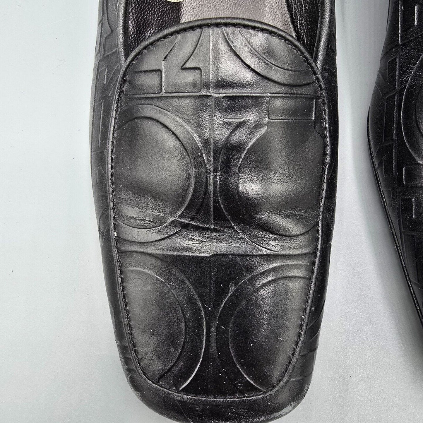 Vintage Salvatore Ferragamo Embossed Gancini Pattern Black Leather Loafers (6B)