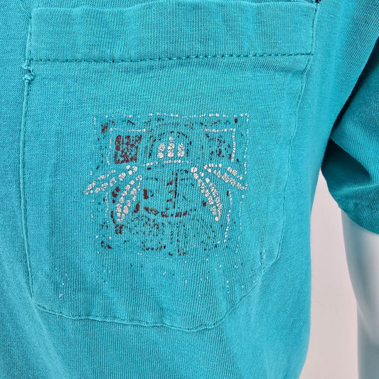 Distressed Vintage 1990s Hanes Faded Tribal Graphic Teal Pocket Tee T-Shirt (M)