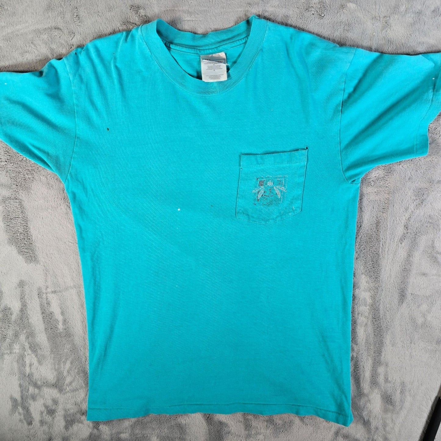 Distressed Vintage 1990s Hanes Faded Tribal Graphic Teal Pocket Tee T-Shirt (M)