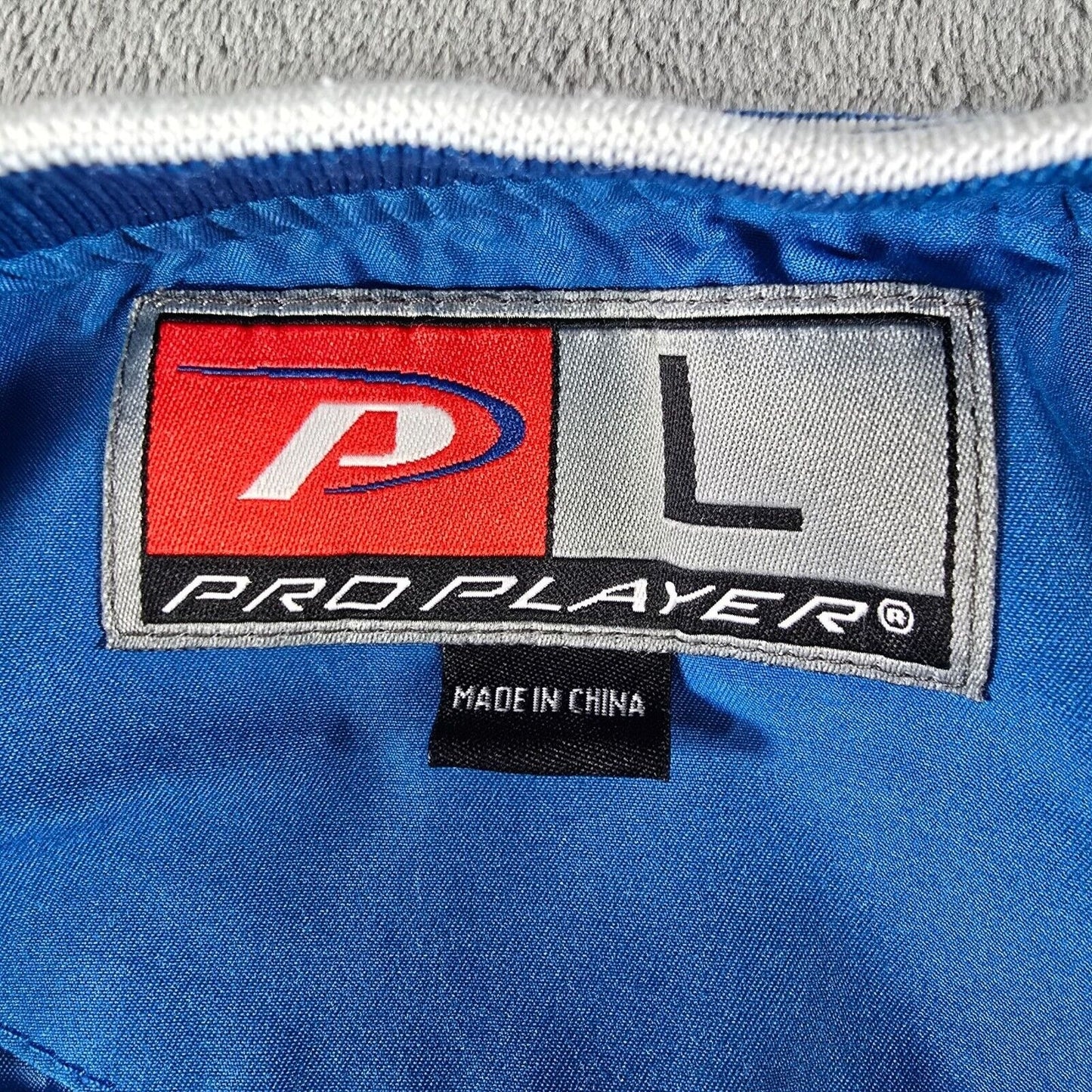 Vintage Y2K Pro Player UK Wildcats Blue and White Pullover Jacket (Large)