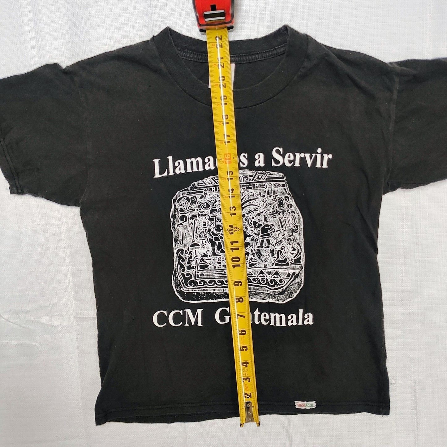 Playeras Coco Rock 'Llamados a Servir CCM Guatemala' Graphic T-Shirt (XS)