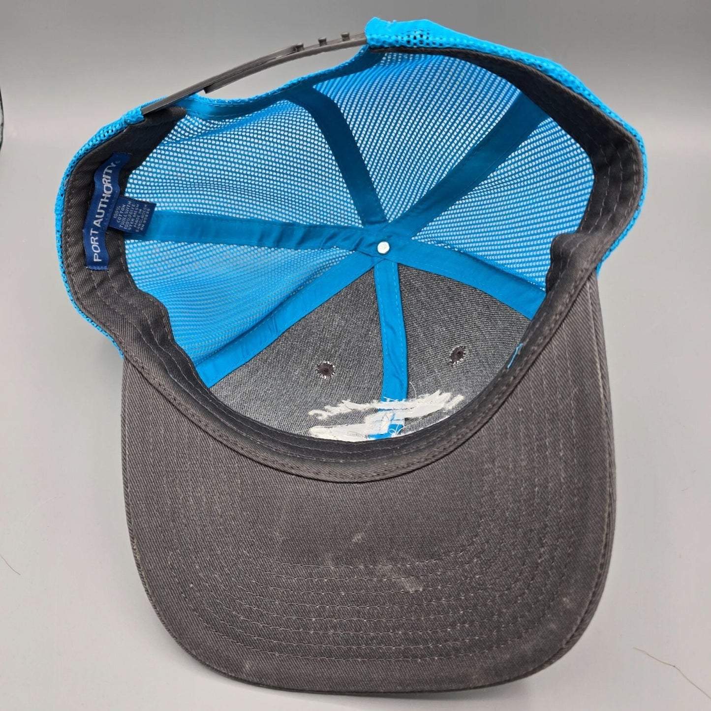 R.C. Faulds, LLC Gunnison Colorado Saddlery Blue & Gray Snapback Trucker Hat