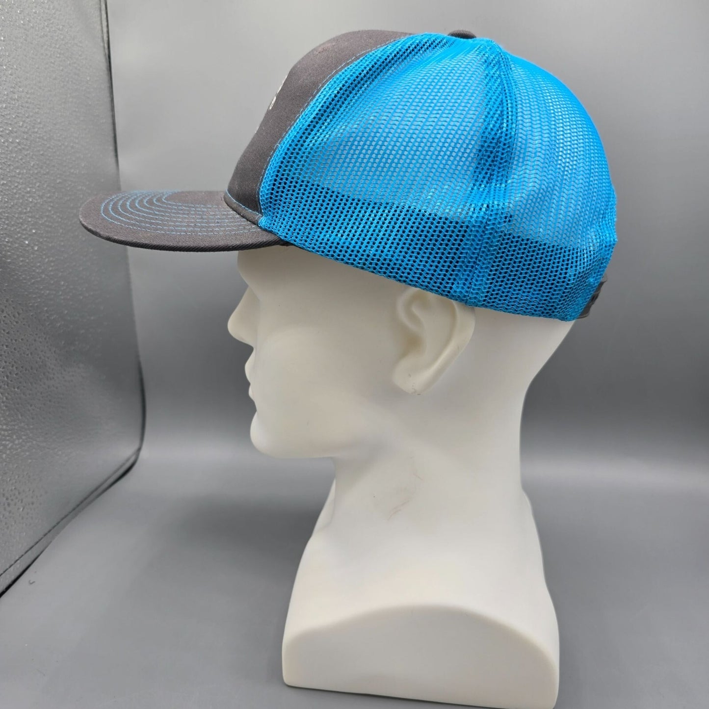 R.C. Faulds, LLC Gunnison Colorado Saddlery Blue & Gray Snapback Trucker Hat