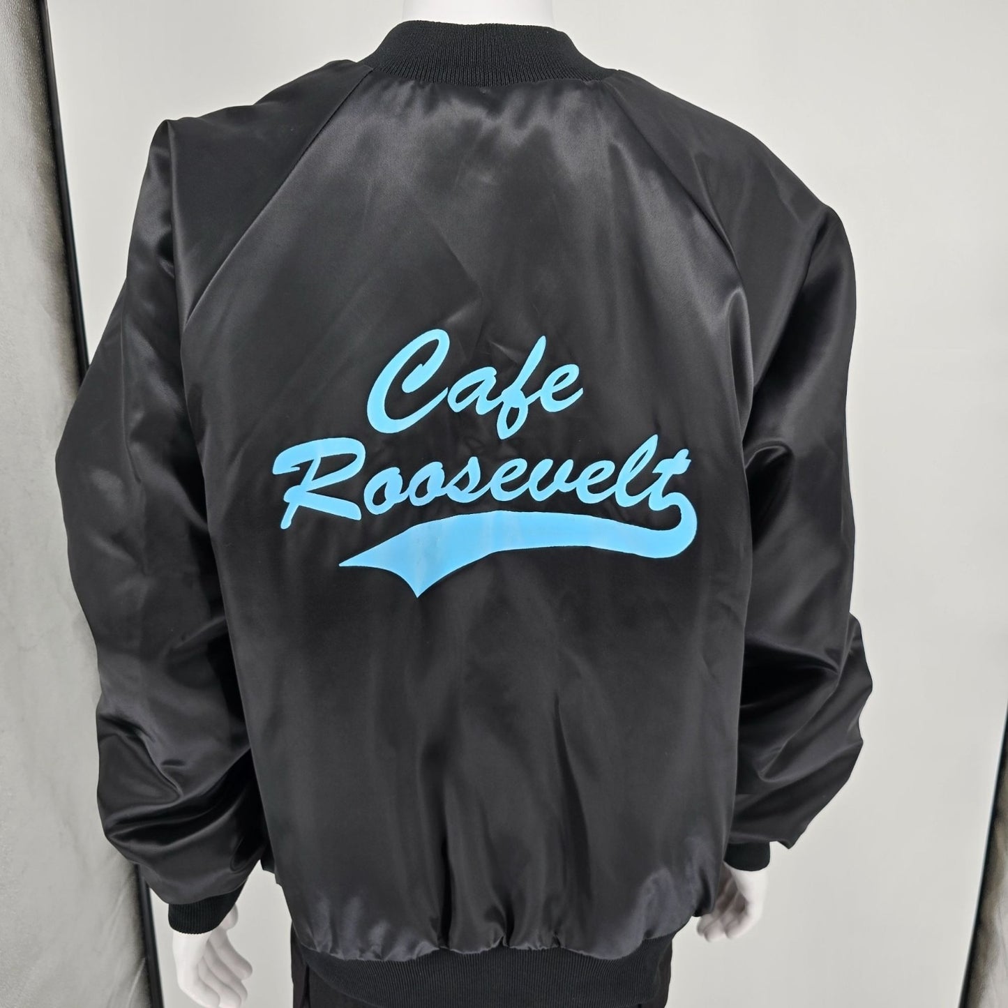 Vintage 1990s Auburn Sportswear Cafe Roosevelt Back Graphic Nylon Jacket (XXL)