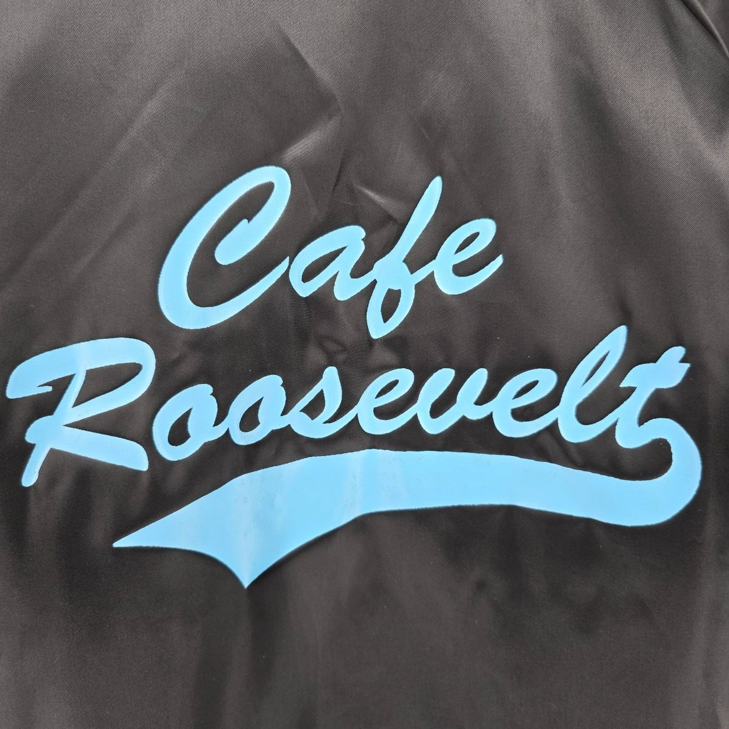 Vintage 1990s Auburn Sportswear Cafe Roosevelt Back Graphic Nylon Jacket (XXL)