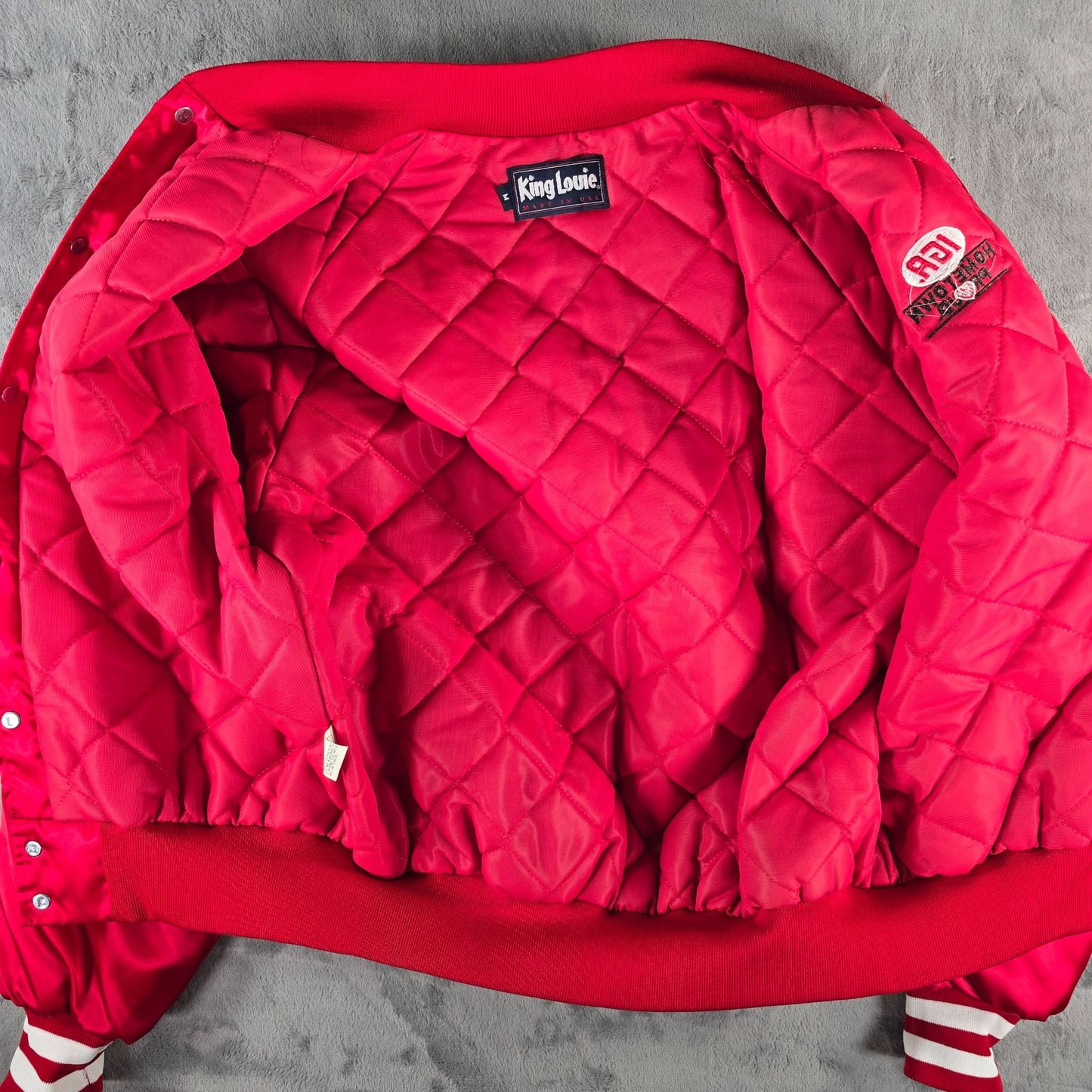 Vintage 1990s King Louie IGA Hometown Proud Nylon Satin Bomber Jacket (M)