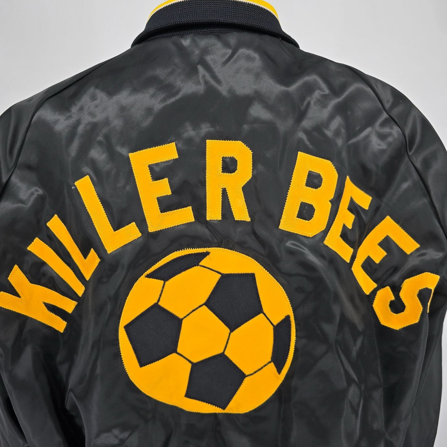 Vintage 1990s Hilton Active Apparel "Kirk" Killer Bees Soccer Nylon Jacket (L)