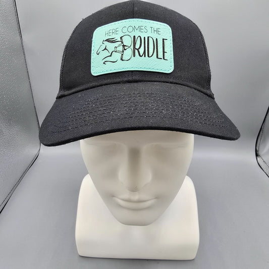 Here Comes The Bridle Port Authority Low-Profile Black Patch Logo Trucker Hat