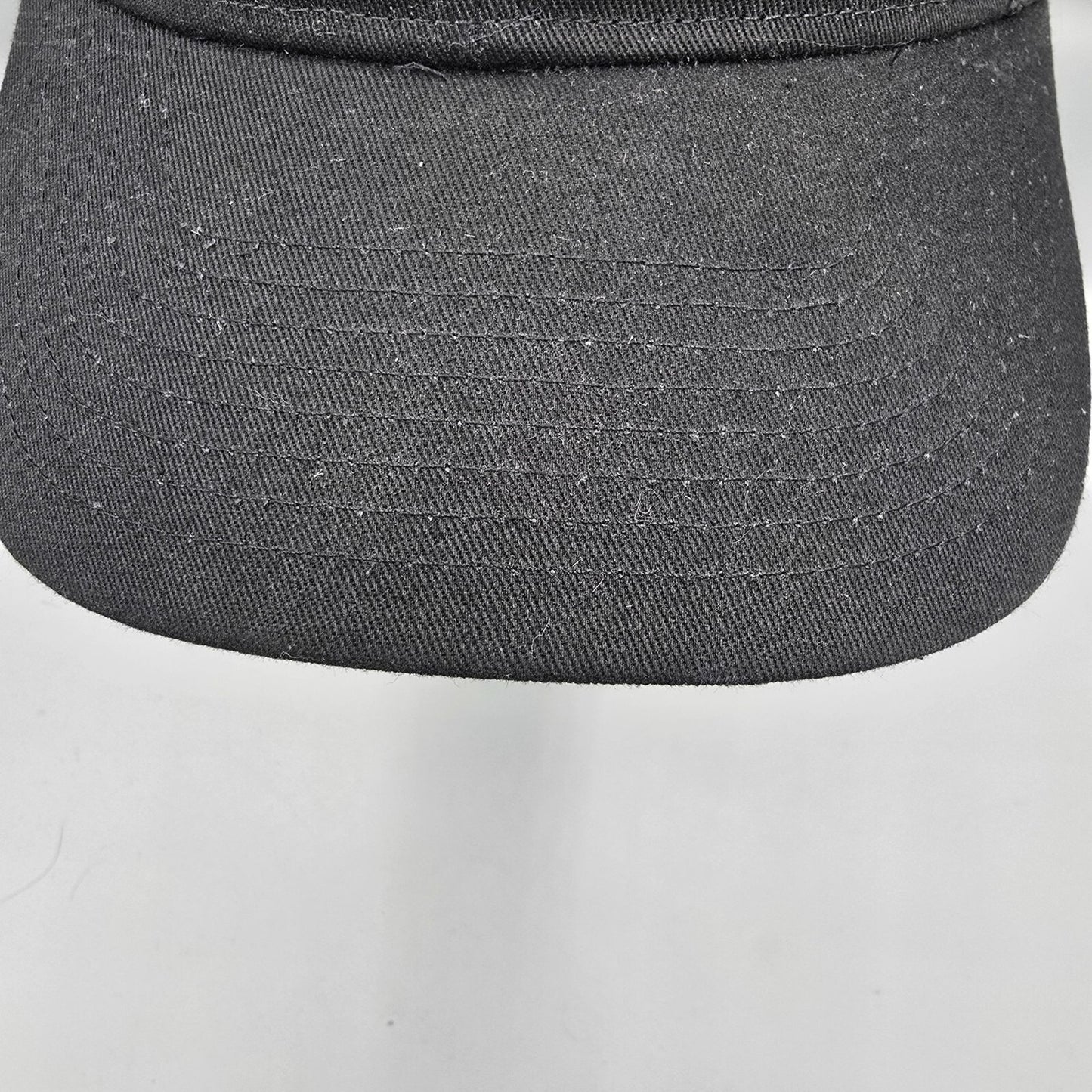 Here Comes The Bridle Port Authority Low-Profile Black Patch Logo Trucker Hat