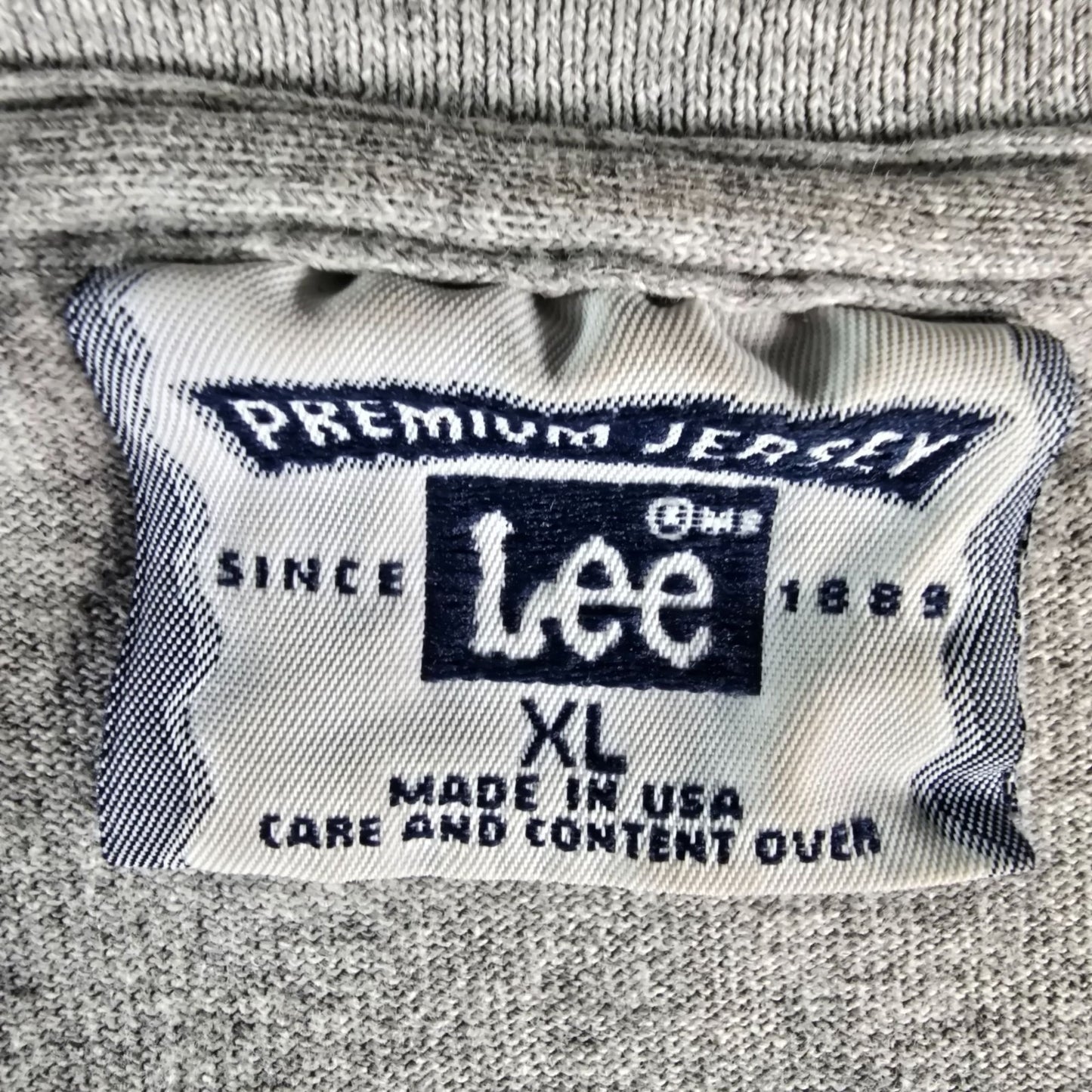 Stained Vintage 1990s Lee Premium Jersey Team Olympus Gray T-Shirt (XL)