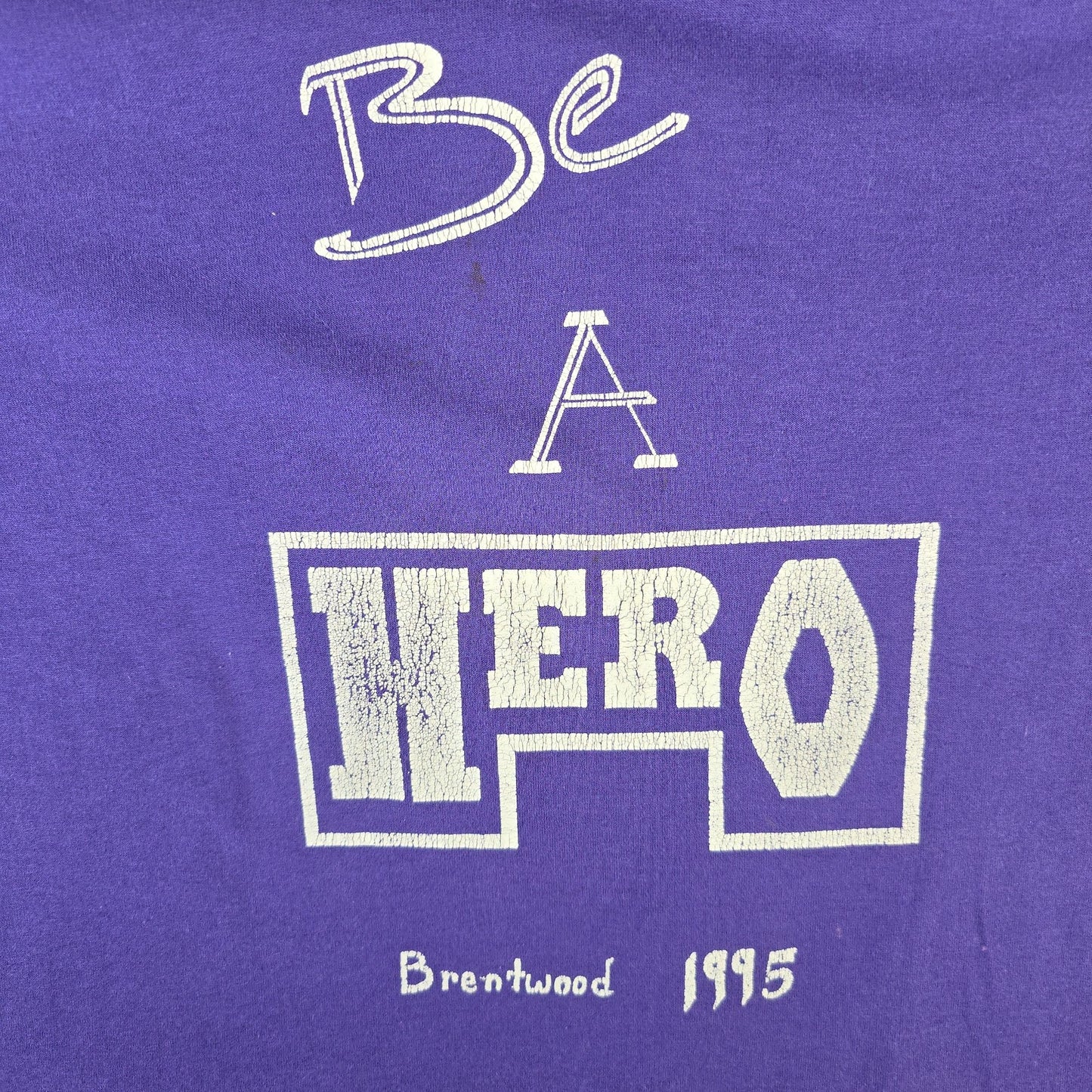 Vintage 1995 Hanes Purple DIY Cropped "Be A Hero" Brentwood T-Shirt (L)