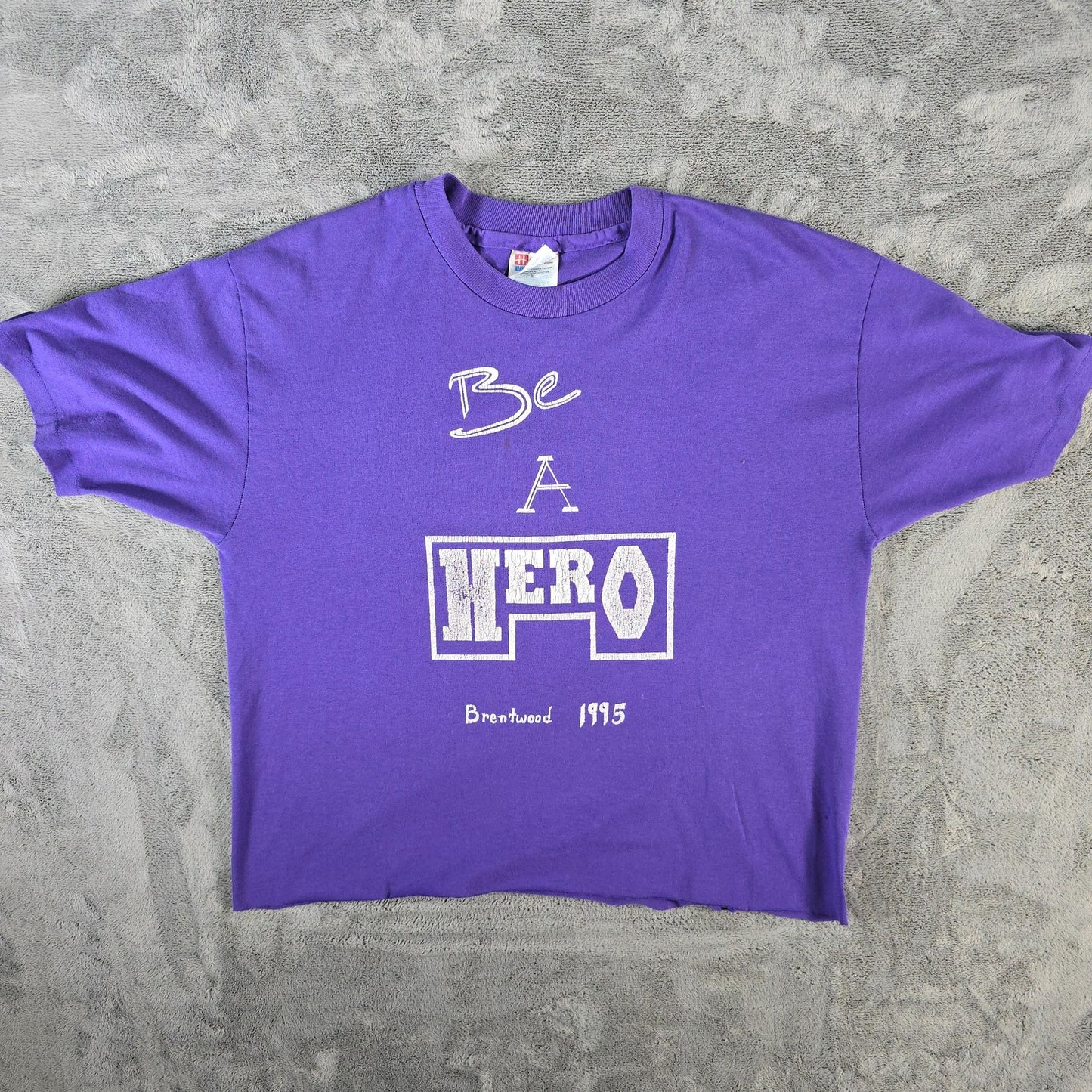 Vintage 1995 Hanes Purple DIY Cropped "Be A Hero" Brentwood T-Shirt (L)