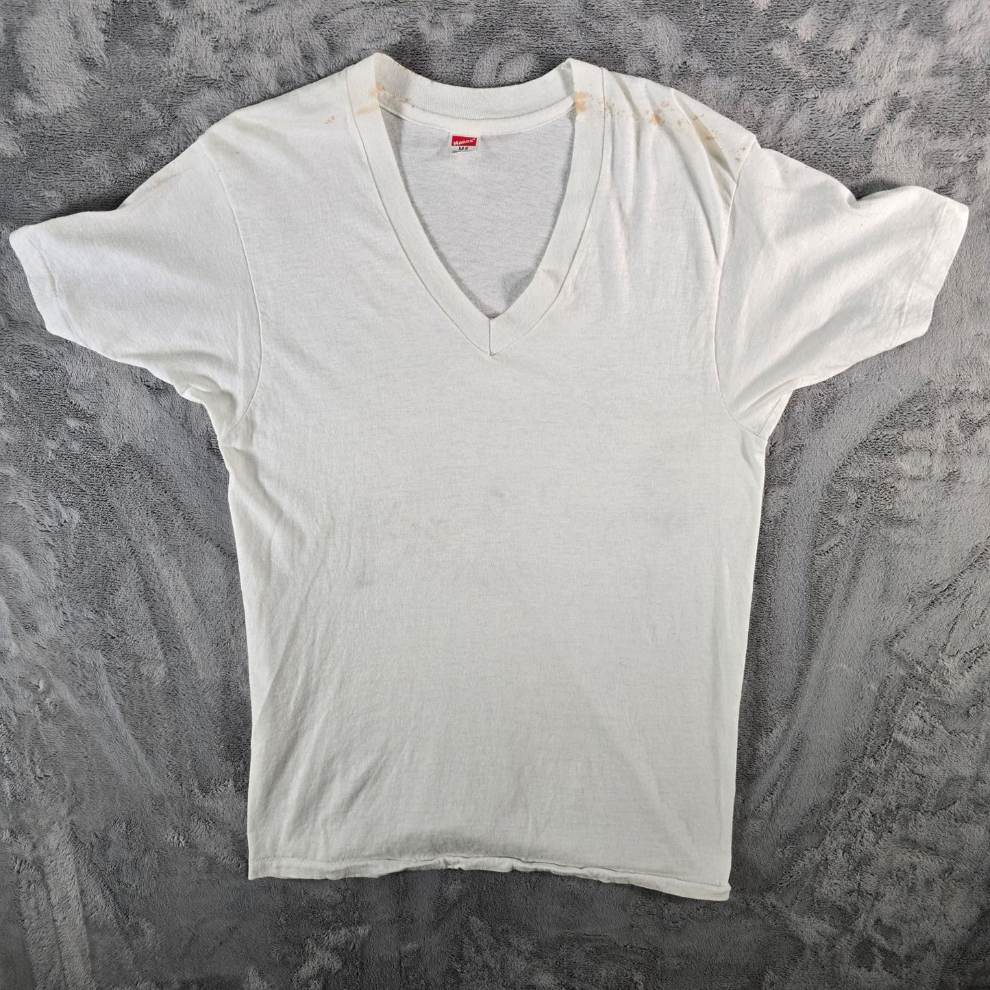 Distressed Vintage Early 1990s Hanes V-Neck Blank White Cotton T-Shirt (S)