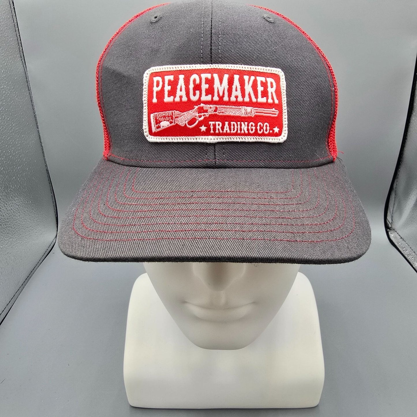 Peacemaker Trading Co. Patch Logo Gray & Red Snapback Richardson Trucker Hat