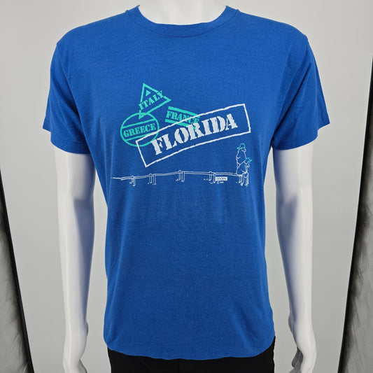 Vintage 1980s Screen Stars Guindon Cartoon Florida Passport Stamps T-Shirt (M/L)