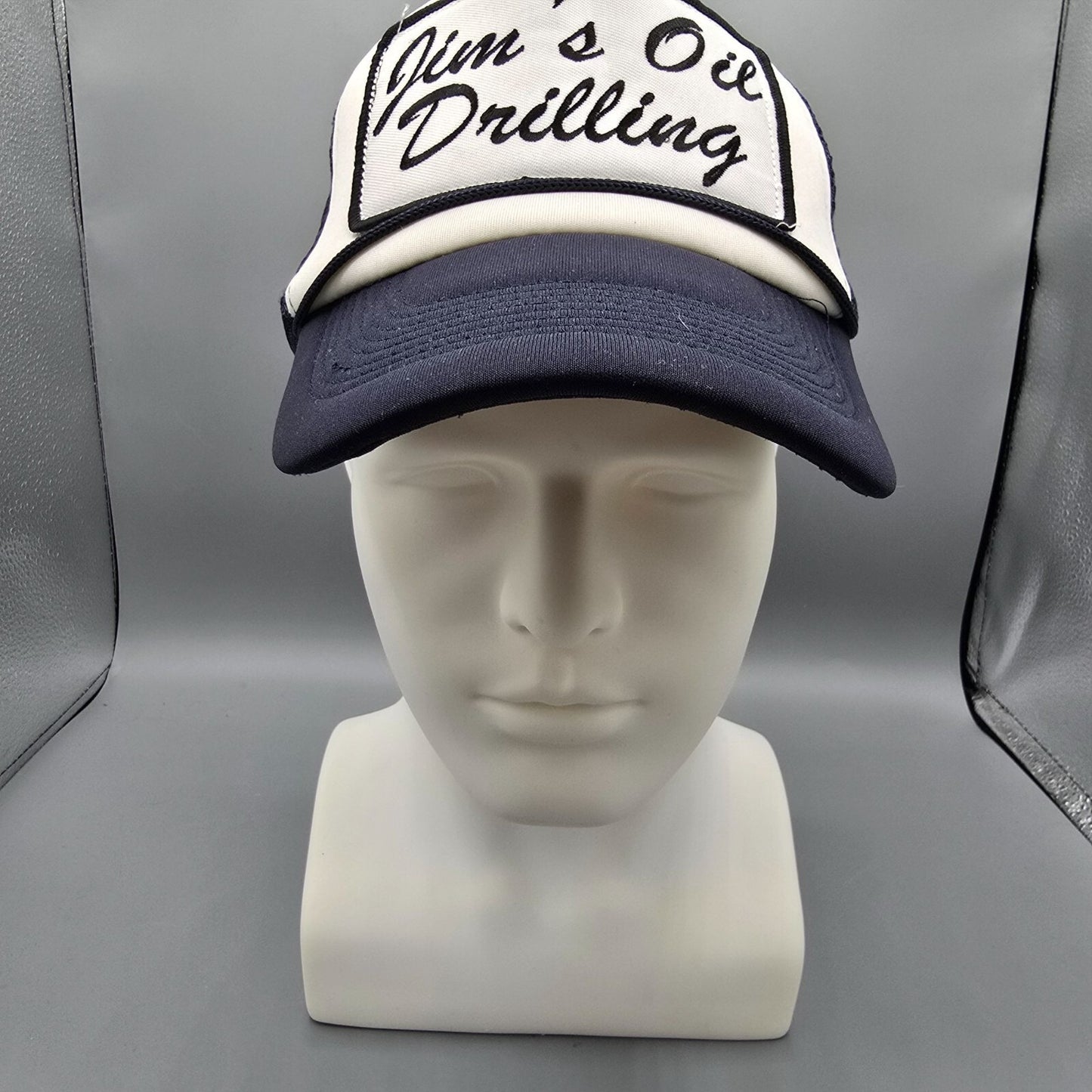Spirit Halloween Jim's Oil Drilling Navy & White Mesh Back Patch Trucker Hat