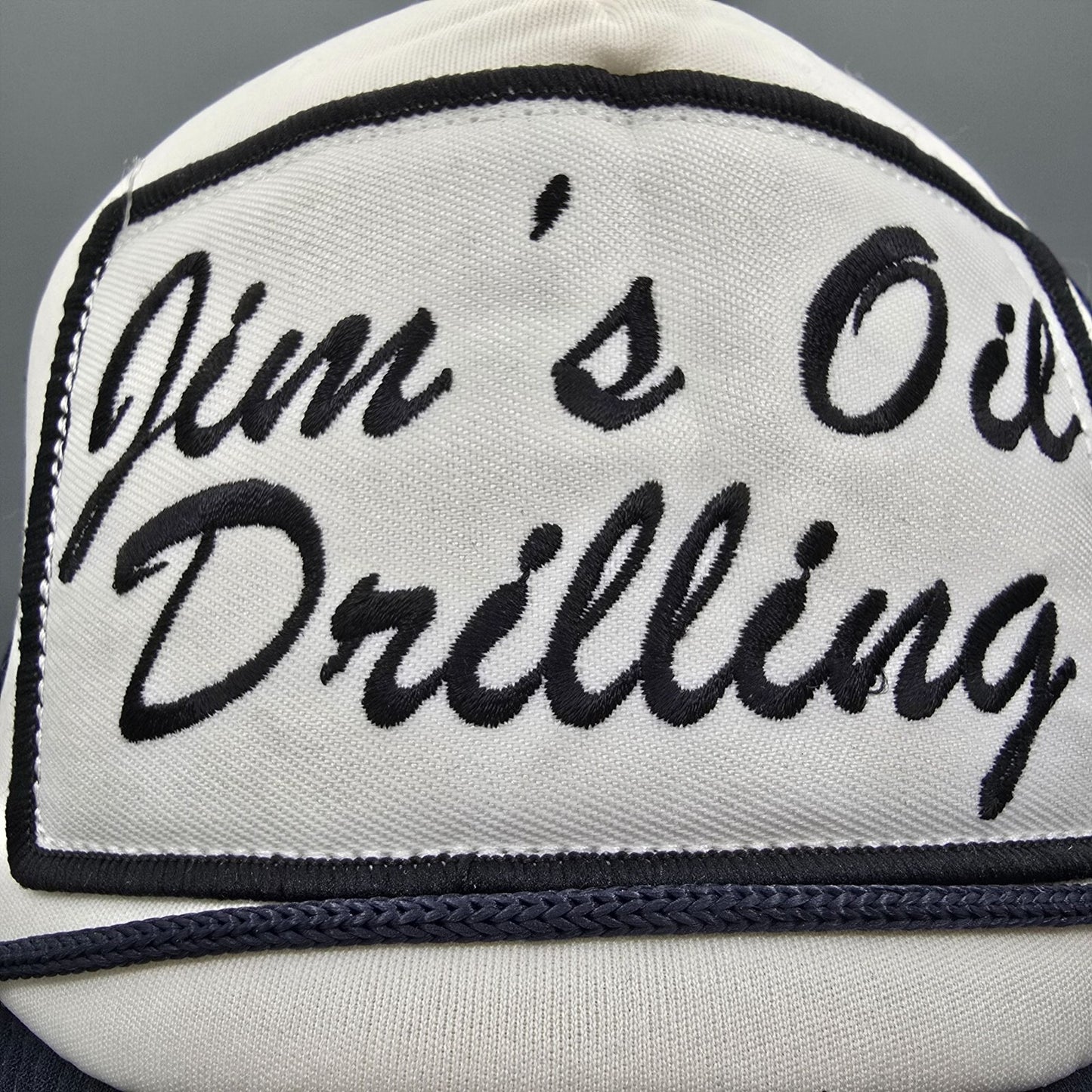 Spirit Halloween Jim's Oil Drilling Navy & White Mesh Back Patch Trucker Hat