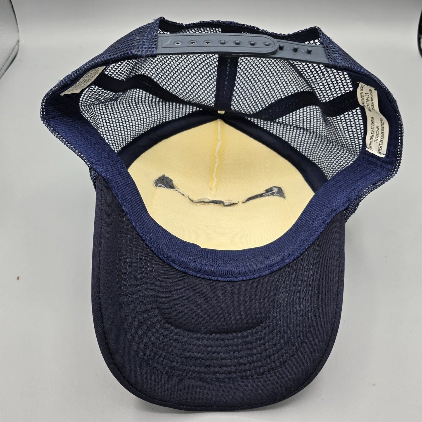 Spirit Halloween Jim's Oil Drilling Navy & White Mesh Back Patch Trucker Hat