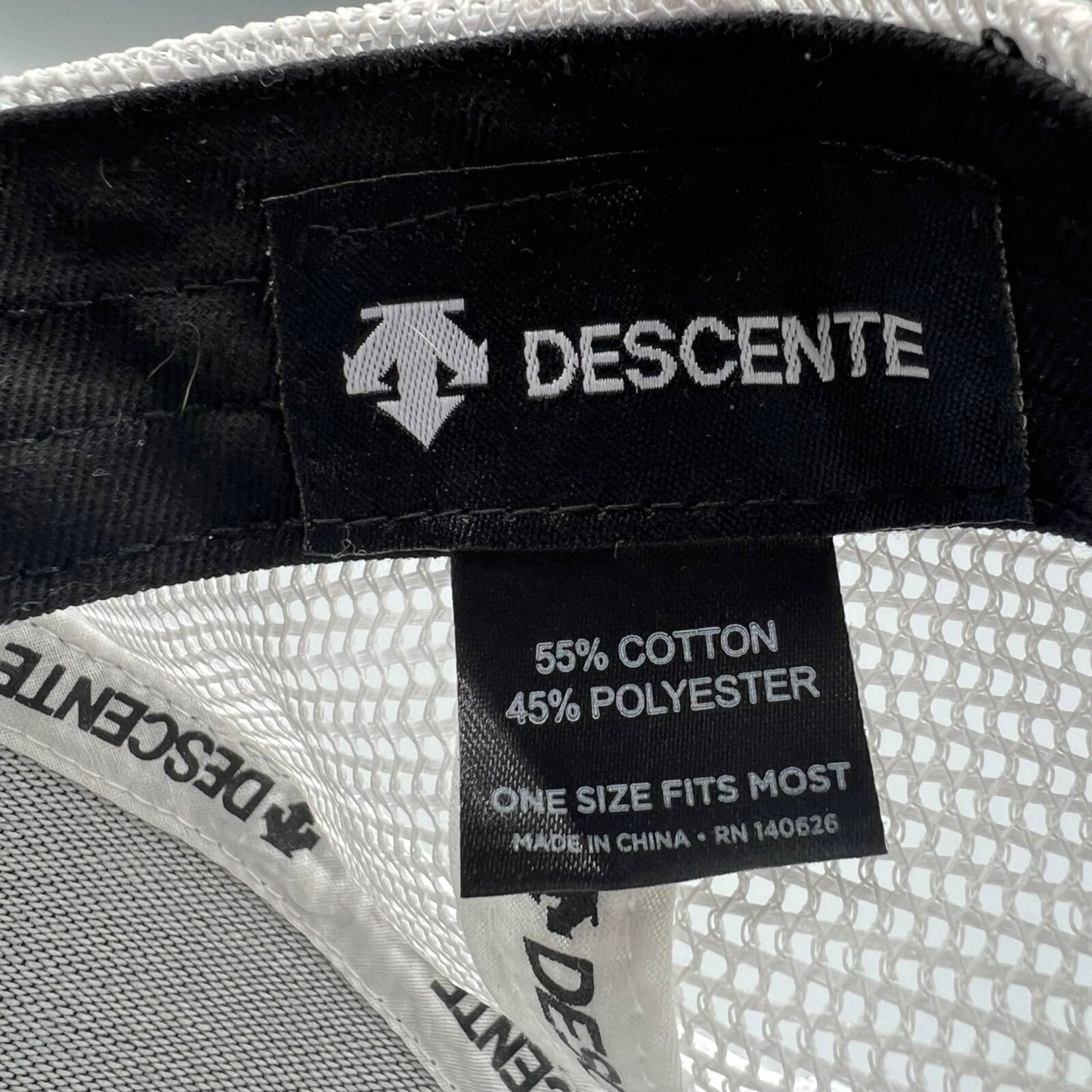 Descente Skiing Mesh Back Six Panel Blue and White Embroidered Logo Trucker Hat
