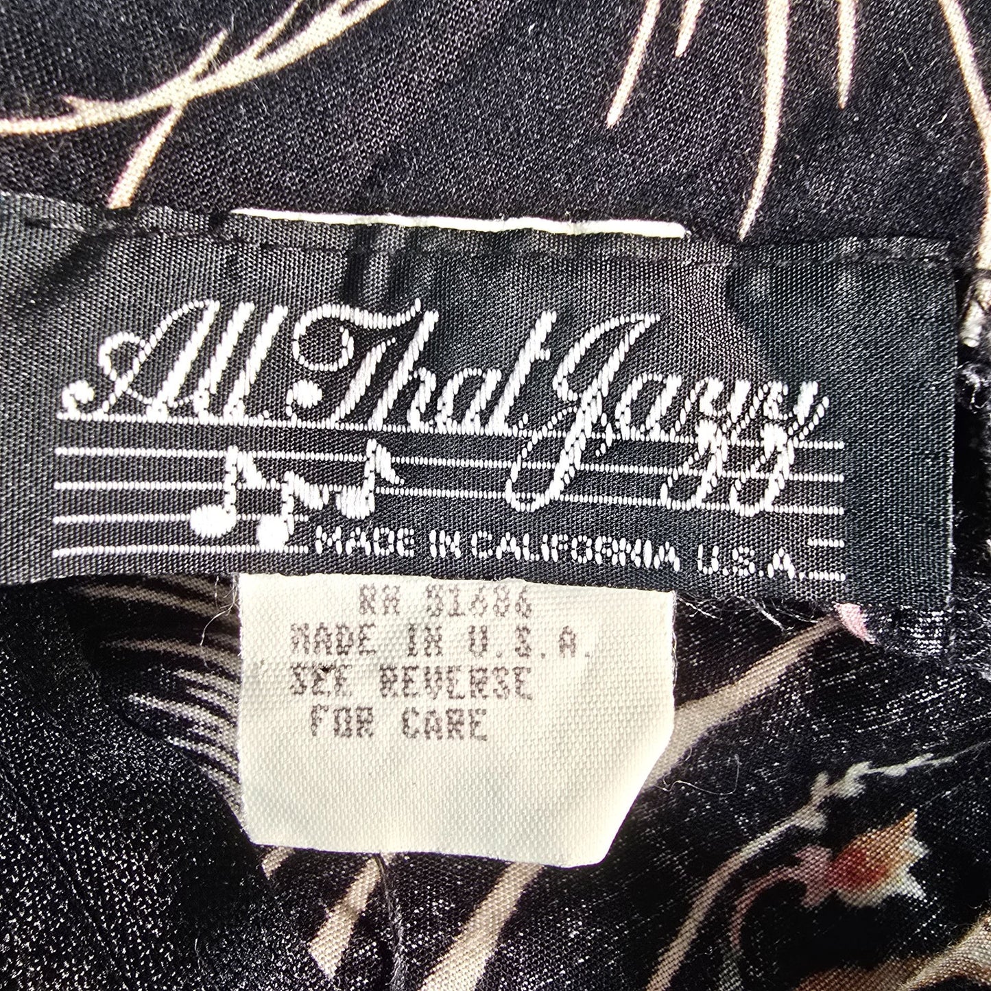 Vintage 1990s All That Jazz Black Floral Rayon Fit and Flare Mini Dress (S)