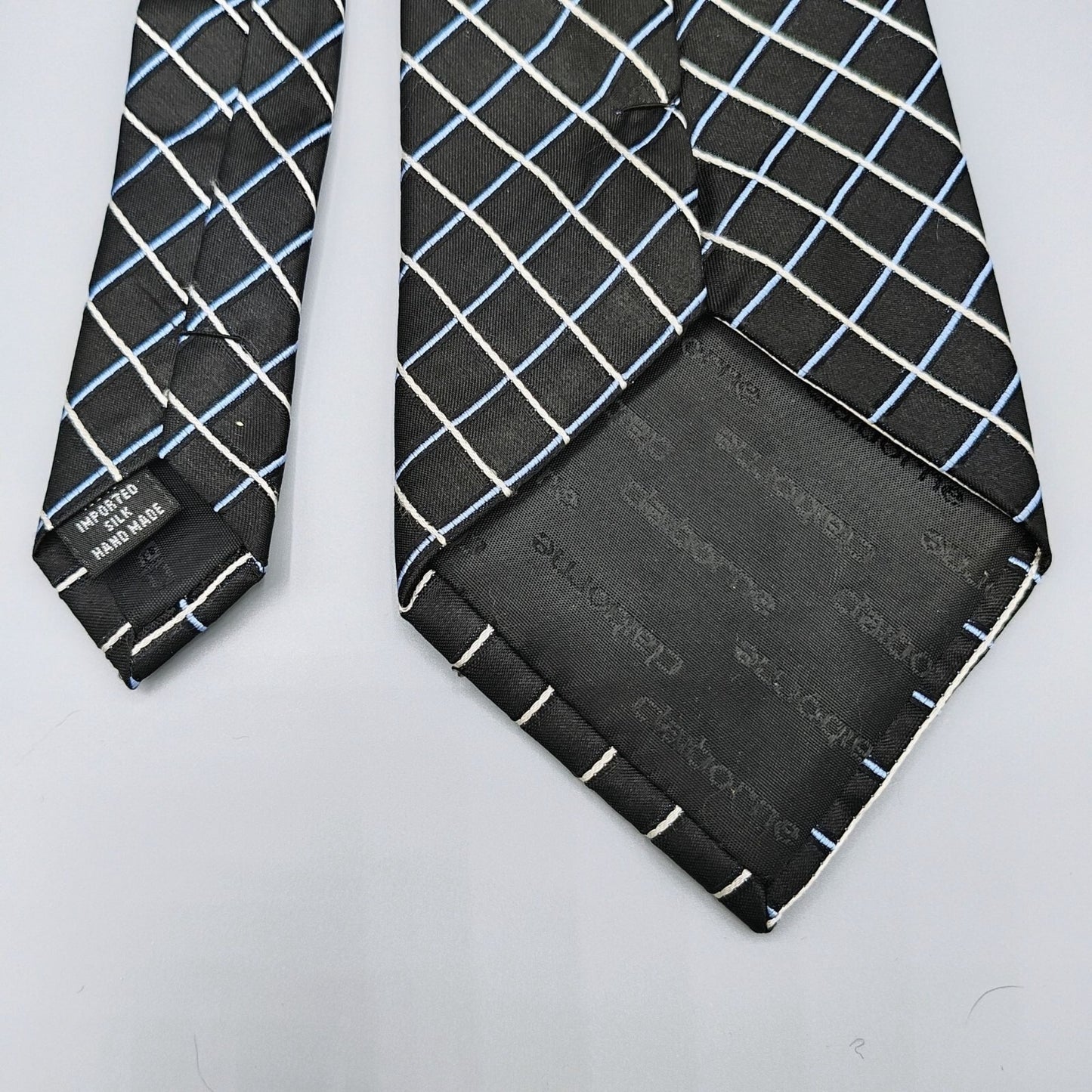 Claiborne Mens Black, Blue, and White Grid Pattern Textured 100% Silk Necktie