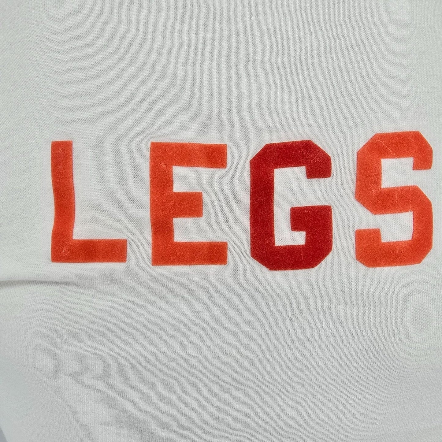 Vintage 1970s H.L. Miller Polish Empire "Legs" Ringer Tee White T-Shirt (XXS)
