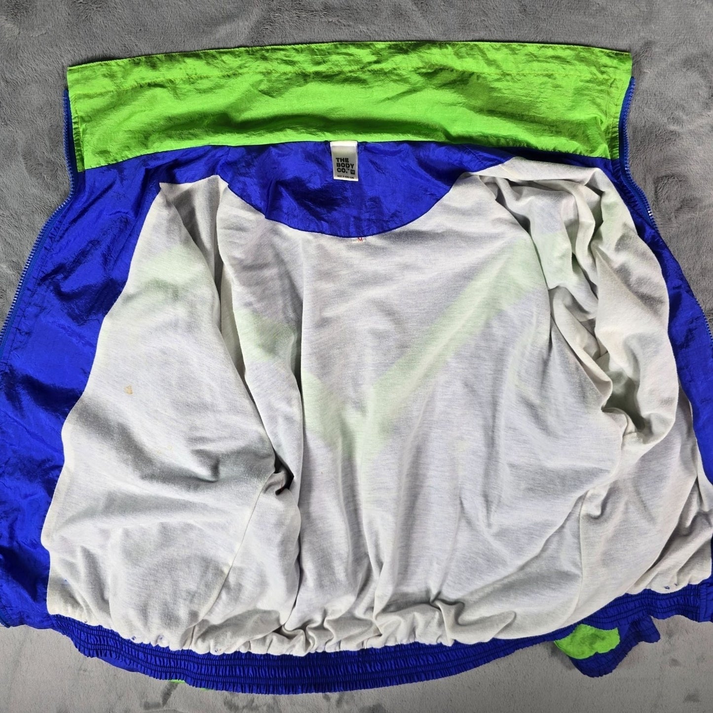 Vintage Early 1990s The Body Co. Women's Oversized Neon Windbreaker Jacket (M)