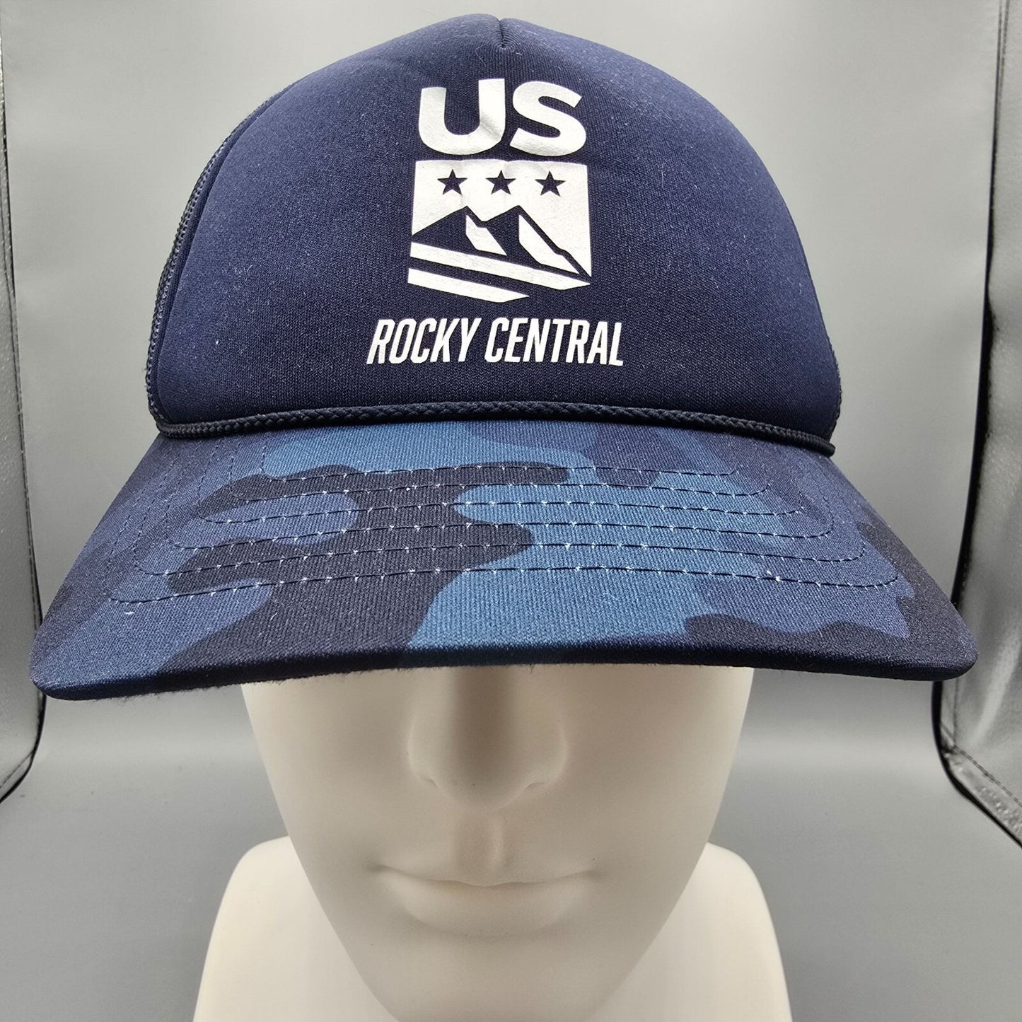 Ski Town All-Stars Vali Colorado US Rocky Central Blue Camouflage Trucker Hat