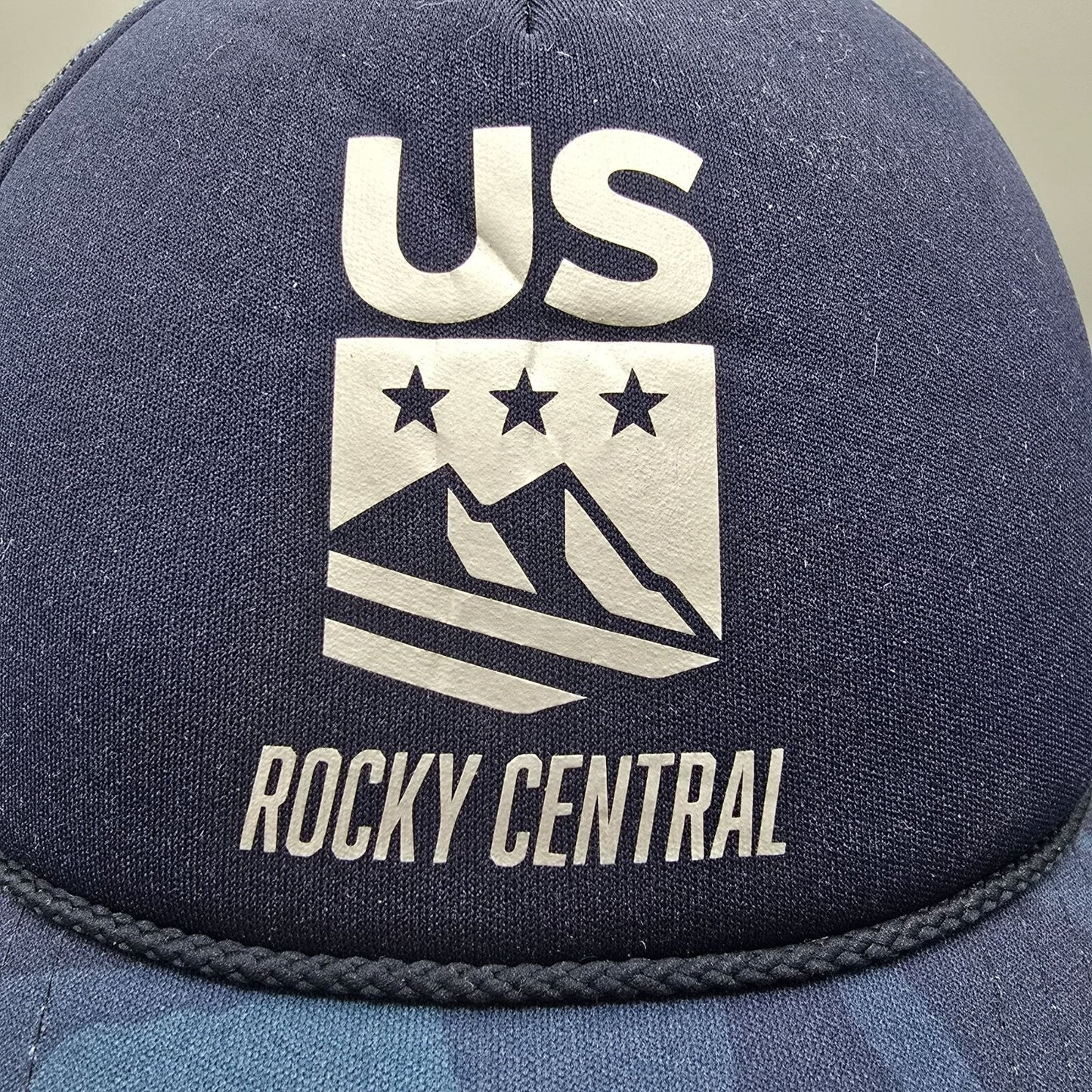 Ski Town All-Stars Vali Colorado US Rocky Central Blue Camouflage Trucker Hat