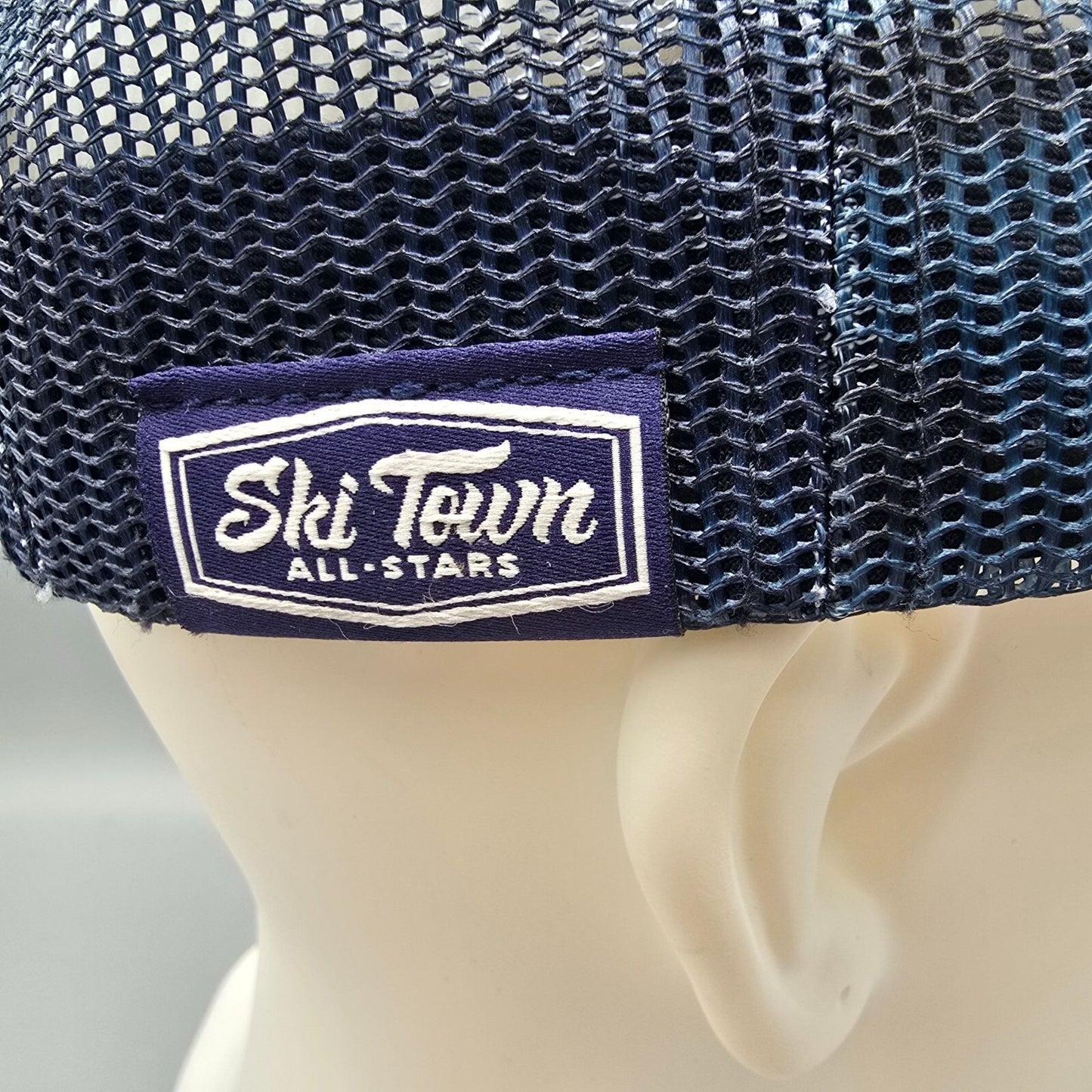 Ski Town All-Stars Vali Colorado US Rocky Central Blue Camouflage Trucker Hat