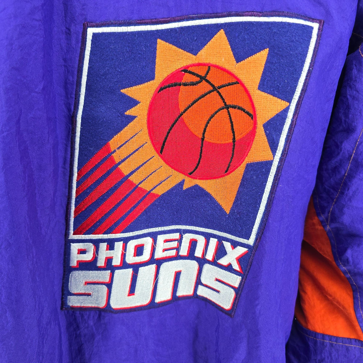 Vintage 1990s Starter Phoenix Suns Insulated/Hooded Color Block Jacket (XL/XXL)
