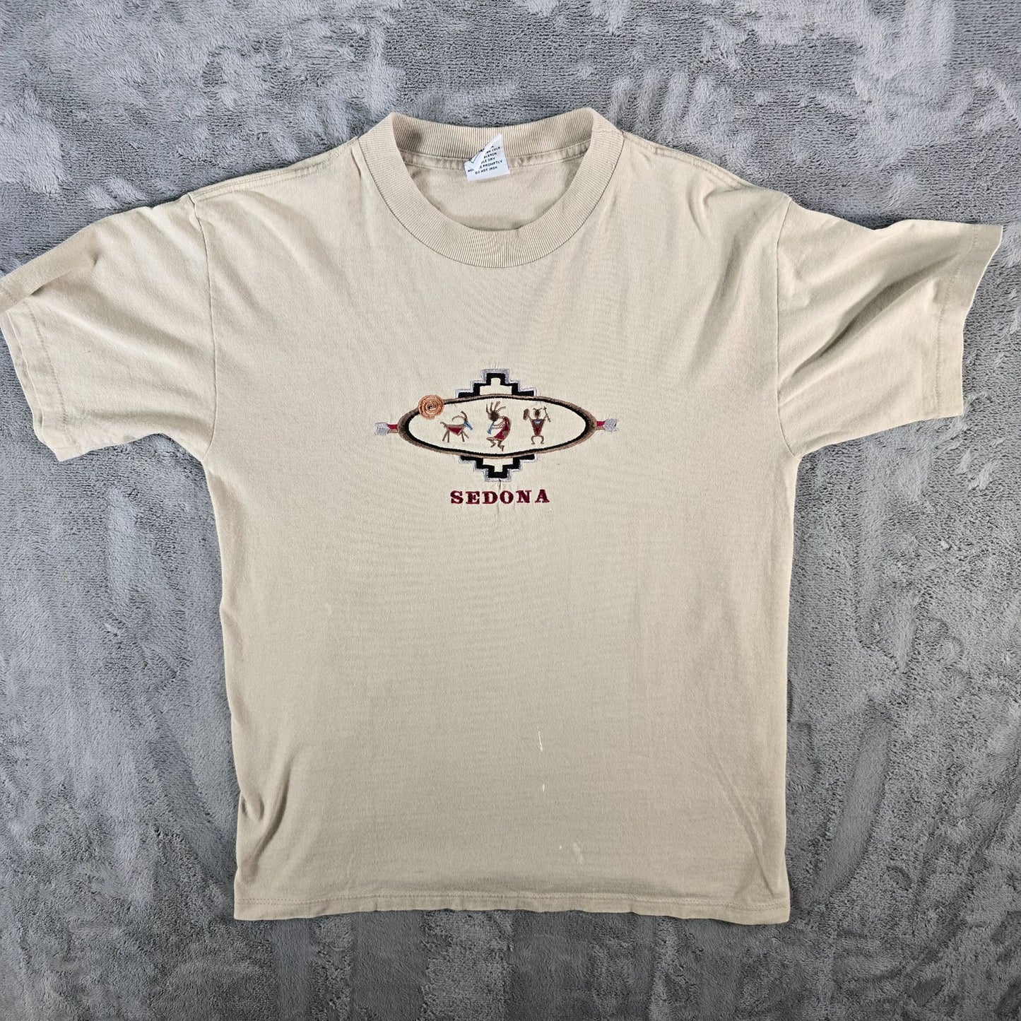 Vintage 1990s P.S.I. Beige Embroidered Sedona Kokopelli Graphic T-Shirt (M)
