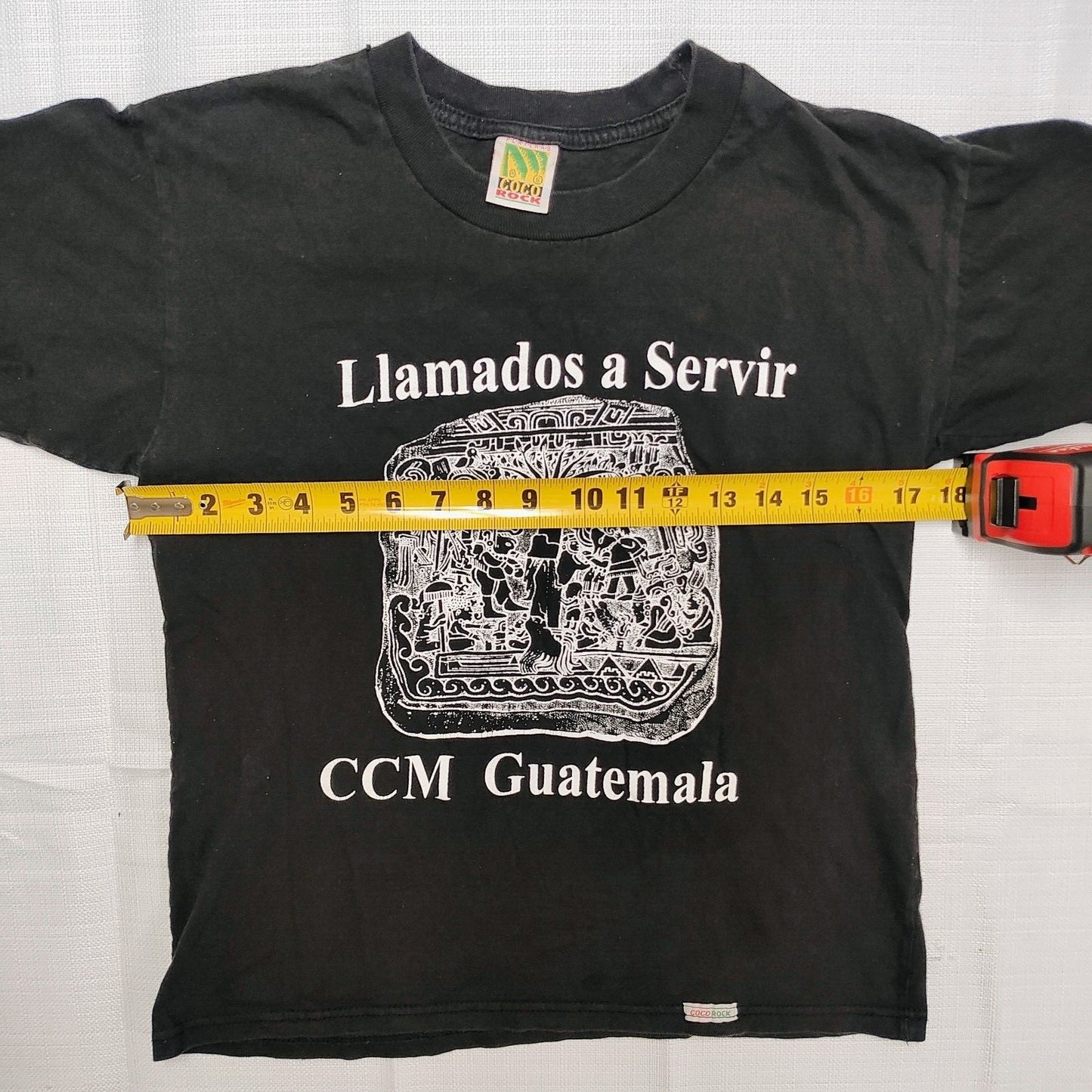 Playeras Coco Rock 'Llamados a Servir CCM Guatemala' Graphic T-Shirt (XS)