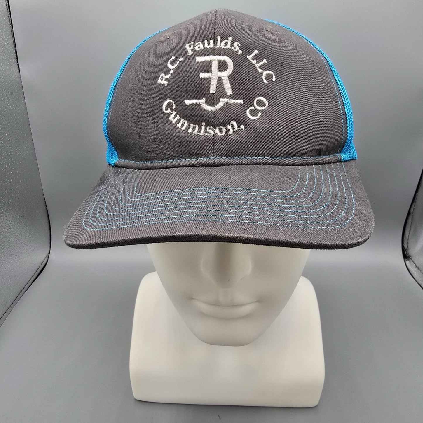 R.C. Faulds, LLC Gunnison Colorado Saddlery Blue & Gray Snapback Trucker Hat