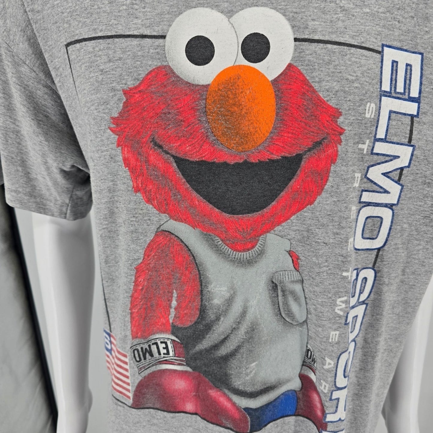 Vintage 1990s Elmo Sport Sportswear Jim Henson's Sesame Street T-Shirt (L/XL)
